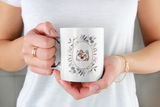 Coffee tea mug with cat graphic in a flower frame
