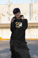 Woman wearing a funny scrabble cat hoodie with letter tiles