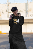Woman wearing a funny scrabble cat hoodie with letter tiles