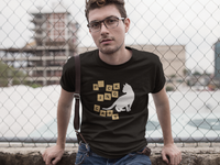 Man wearing graphic t-shirt of cat and scrabble letters